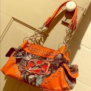 orange studded camo purse